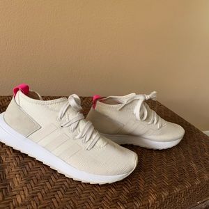 Women’s cream adidas gym shoes